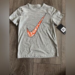 Nike Kids Heather Gray Tee with Vibrant Orange Swoosh
